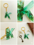 Handmade Resin Letter Keychain – Emerald Forest Green with Dried Botanicals | Custom Initial A-Z