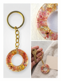 Handmade Resin Ring Keychain – Crushed Pink Flowers with Gold-Tone Foil | Circle Donut Shape